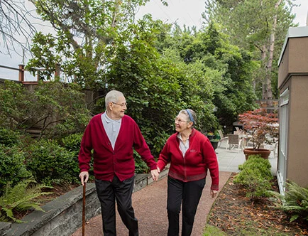 Discover 1 couple in red walking 1