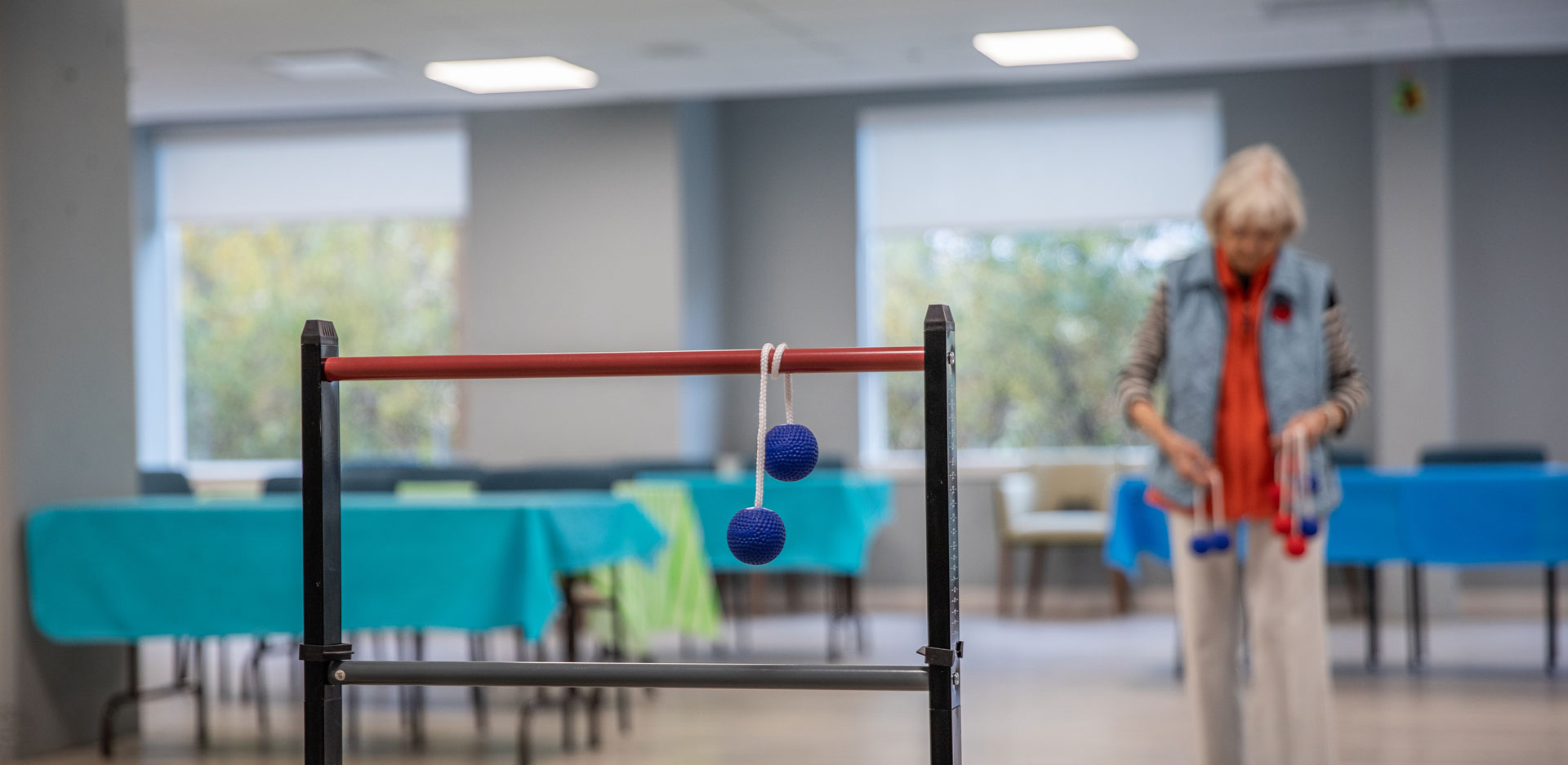 resident playing ladder toss